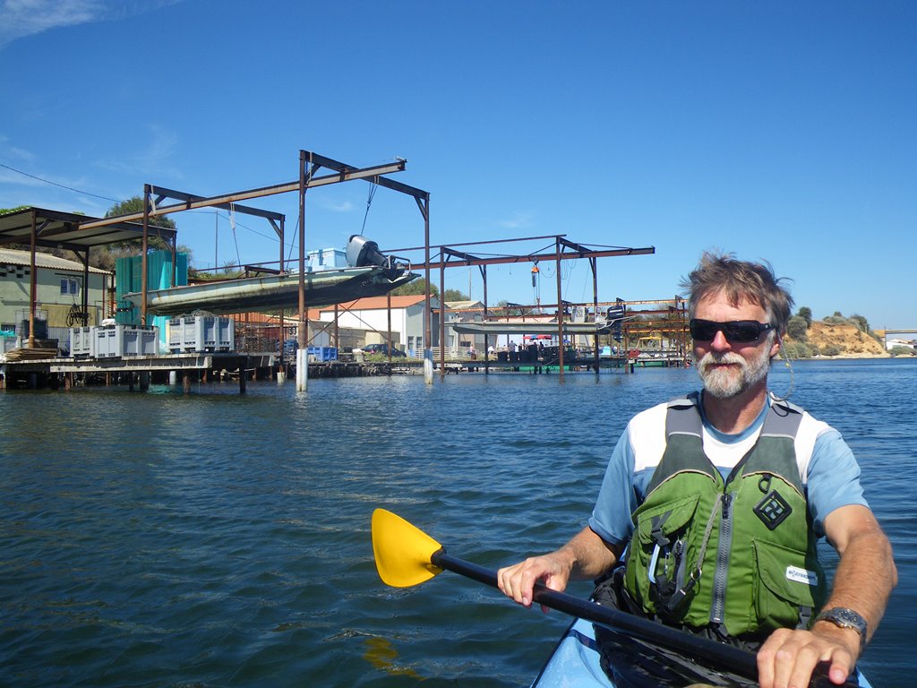 Oyster farm docks with boats hoisted